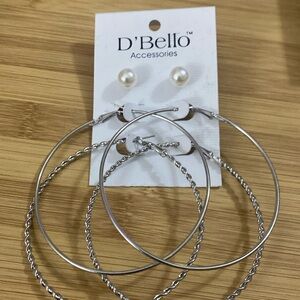 D’Bello accessories. Three pairs of fashion earrings.2 hoops, 1 post